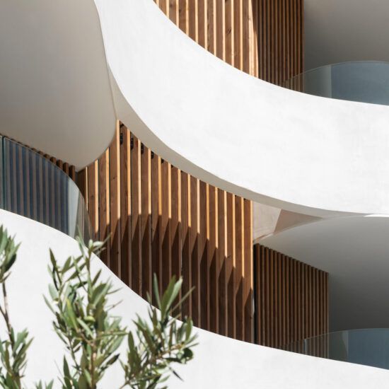 alt:"Exterior facade photograph of a building in Village Verde of Sotogrande"